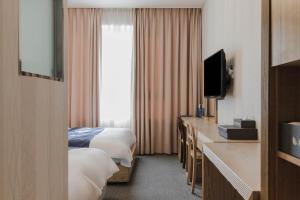 Postel nebo postele na pokoji v ubytování Incheon Aiport Airrelax hotel