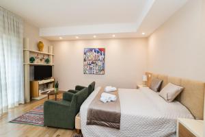 TV a/nebo společenská místnost v ubytování GoodStay Cianci Luxury Room + 24 fotografií