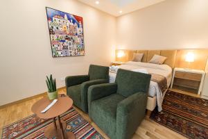 Postel nebo postele na pokoji v ubytování GoodStay Cianci Luxury Room