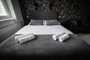 Rúm í herbergi á Garni hotel Svitavy