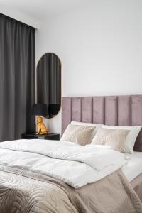Ліжко або ліжка в номері RentPlanet - Legnicka Residence