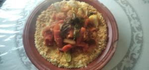 a bowl of food with carrots and other vegetables at Familles avec bébé in Fès