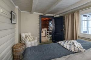 Llit o llits en una habitació de Koselig hytte 10 minutter fra Lillehammer sentrum