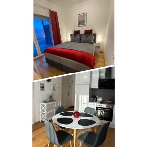 - une chambre et une chambre avec un lit et une table dans l'établissement CityLake G23 Apartments, à Gmunden