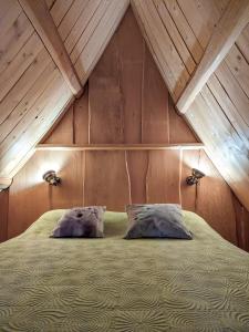 Tempat tidur dalam kamar di Valsoyo
