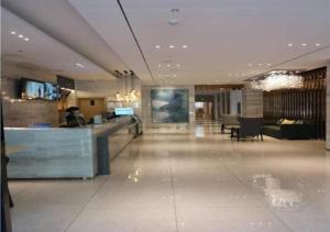 The lobby or reception area at City Comfort Inn Baoding Baobai Shopping Plaza