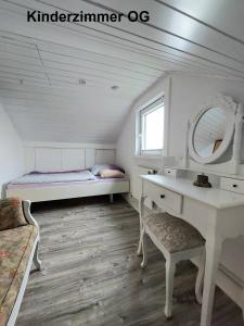 En eller flere senge i et værelse på Zum Eiderweg Hennstedt + 24 billeder