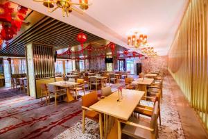 Restaurace v ubytování Ming Guan Hotel