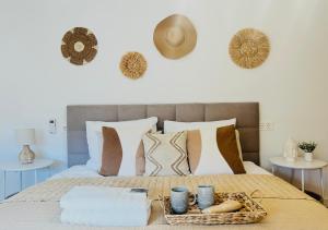 a bedroom with a bed with a tray on it at Appart SALOU BEACH & PORT AVENTURA & FERRARI LAND 6-8 pers in Salou