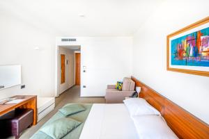Postel nebo postele na pokoji v ubytování Hotel Vrilo - Adults Only
