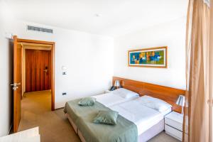Postel nebo postele na pokoji v ubytování Hotel Vrilo - Adults Only