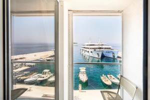 a view of a harbor with boats in the water at Hotel Vrilo - Adults Only in Postira