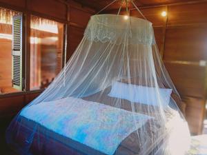 Postel nebo postele na pokoji v ubytování Meta Homestay