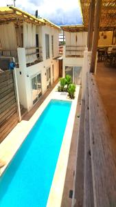 a swimming pool in the backyard of a house at Boho Boutique Villa - Adults Only in Kiwengwa