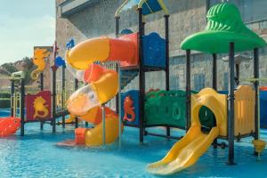 a water park with a bunch of playground equipment at Grand Ocean Sokhna Hotel in Ain Sokhna