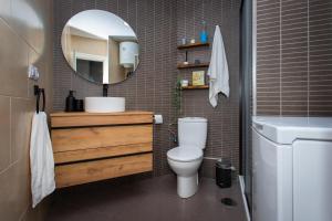 Koupelna v ubytování Loft a orillas del Mar Mediterráneo + 19 fotografií