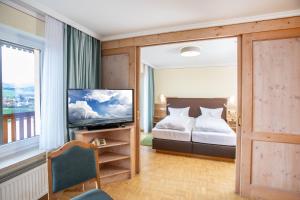 Postel nebo postele na pokoji v ubytování Hotel Sonnentau
