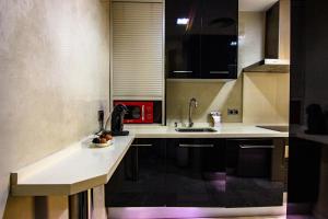 A kitchen or kitchenette at Apartamento amplio y luminoso a 2 min del Centro