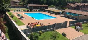 an overhead view of a swimming pool in a yard at Residence Malpensa in Somma Lombardo