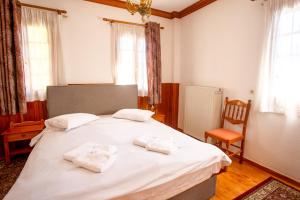 Voodi või voodid majutusasutuse Hotel Adonis toas