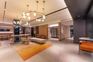 The lobby or reception area at Nihao Hotel Qidong Aobang Plaza