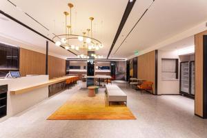 The lobby or reception area at Nihao Hotel Qidong Aobang Plaza