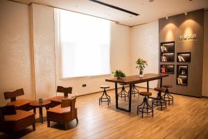 Restoran või mõni muu söögikoht majutusasutuses Hanting Hotel Hohhot Jinqiao Development Zone