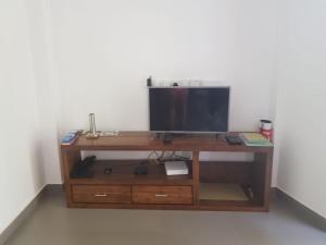TV a/nebo společenská místnost v ubytování River Pearl Villa