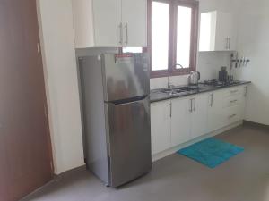 Kuchyň nebo kuchyňský kout v ubytování River Pearl Villa