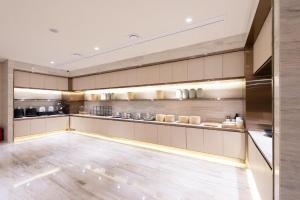 A cozinha ou cozinha compacta de Ji Hotel Shijiazhuang Grand Theatre