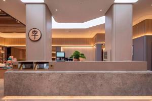 El vestíbulo o zona de recepción de Ji Hotel Shanghai Fengzhuang Qilianshan Nan Road