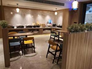Restavracija oz. druge možnosti za prehrano v nastanitvi Hanting Premium Hotel Youjia Shanghai Nan Bund Dalian Road