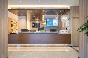 Lobbyn eller receptionsområdet på Hanting Premium Hotel Youjia Shanghai Nan Bund Dalian Road