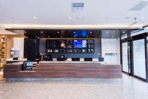 De lobby of receptie bij Hanting Premium Hotel Youjia Changchun Shuangyang Yiyang Building