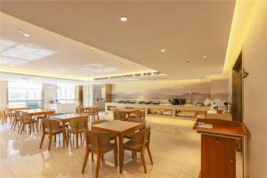 Restoranas ar kita vieta pavalgyti apgyvendinimo įstaigoje Ji Hotel Wuhan Hankou Railway Station Tangjiadun