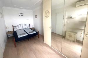 Postel nebo postele na pokoji v ubytování Club218 Holiday Apartman Siófok