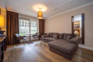 Posezení v ubytování Fletcher Hotel-Restaurant Arneville-Middelburg