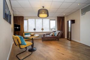 Posezení v ubytování Fletcher Hotel-Restaurant Arneville-Middelburg