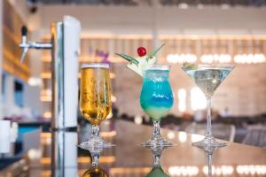 two glasses of drinks sitting on a table at Impressive Punta Cana - All Inclusive in Punta Cana