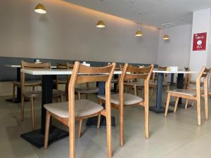 Restoran ili drugo mesto za obedovanje u objektu Hanting Hotel Shijiazhuang Zhuanghuai Zhong Road