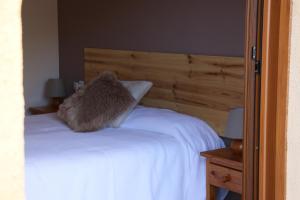 Postel nebo postele na pokoji v ubytování Hotel Balcó del Priorat