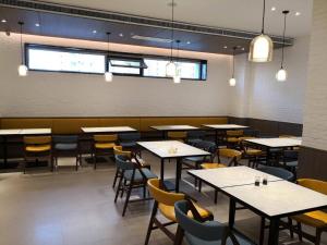 A restaurant or other place to eat at Hanting Premium Taiyuan Economic Development Zone