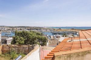a view of a harbor with boats in the water at Casa da Avó - City Center - Private Bedrooms in Lagos