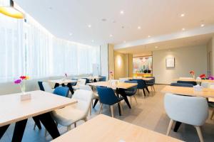 Restoran või mõni muu söögikoht majutusasutuses Hanting Hotel Xian Changan Northwest University