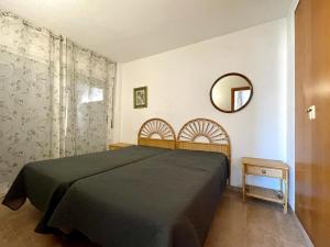 A bed or beds in a room at COSTA DAURADA APARTAMENTS CENTER Még 10 kép