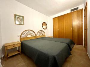 A bed or beds in a room at COSTA DAURADA APARTAMENTS CENTER
