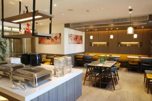 Restaurant o un lloc per menjar a Hanting Premium Hotel Chengde Summer Resort Dutong Mansion