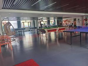 Tischtennis in der Unterkunft Hanting Hotel Tongliao Inner Mongolia University for Nationalities oder in der Nähe