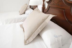 Postel nebo postele na pokoji v ubytování Hotel San Miguel
