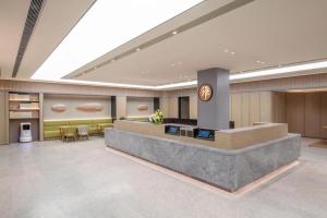 The lobby or reception area at Ji Hotel Beijing Olympic Sports Center Bird'S Nest